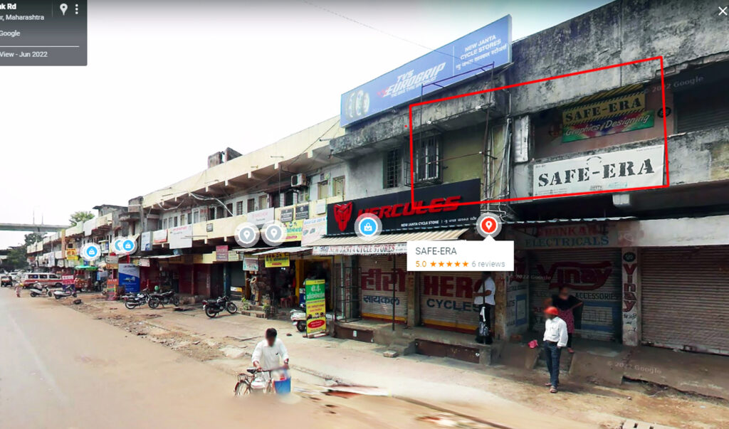 google earth street photograph of nagpur city, area - sadar, specially showing the office location picture of safe-era office, where safe-era sign board is visible and safe-era graphic designing board is also visible, this street is called Link Road, Sadar, nagpur (maharashtra) 440001 Nagpur, safe-era block no. C/42, at first floor. picture showing market area, with many shops & road is also visible at picture