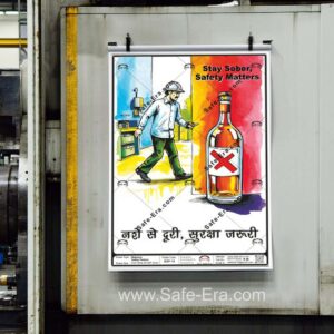 A 'Stay Sober, Safety Matters' behaviour safety poster (Code: BSP-18) displayed on industrial machinery. The poster warns against substance use and features an illustration of a sober worker walking away from a bottle of alcohol marked with a red 'X'. The core message is displayed in English and Hindi: 'Stay Sober, Safety Matters' and 'नशे से दूरी, सुरक्षा ज़रूरी' (Distance from intoxication, safety is necessary).