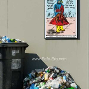 Safe-Era chemical Safety poster CSP-16, mockup image of chemical & plastic garbage corner with a stack of garbage in the corner of the wall with big black garbage bin full with plastics - Poster Image showing - well dressed chemical safety worker holding a chemical waste polythene in his hand & going to throw it in the open space, back of poster showing industrial line sketch . Slogan written in both English & Hindi language. English slogans says - “Use proper procedure of chemical handling, it might be very sad to regret later”.