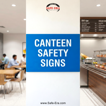 Safe-Era Canteen Safety Signs category link. Blue signboard displaying 'Canteen Safety Signs' in a modern cafeteria setting.
