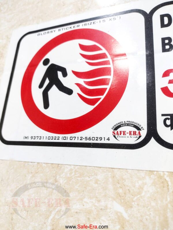 Detailed view of Safe-Era safety sticker design and branding.